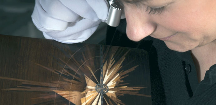 A craftsperson at work on a Bespoke Rolls-Royce.