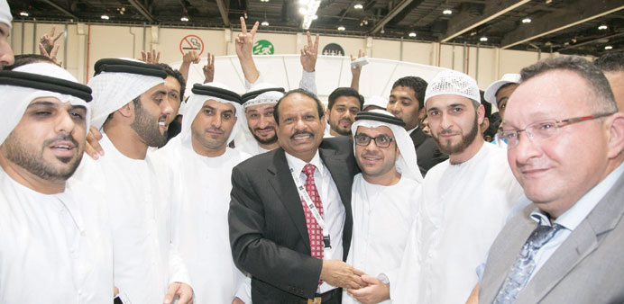 Local business leaders and citizens congratulate Yusuff Ali.