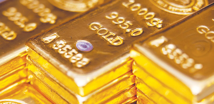 Gold tumbled as low as $1,492.68 ounce on Friday, hit by the strong dollar and speculation over the sale of Cyprus reserves.