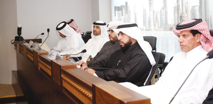 Al-Kubaisi (second right) at CMC yesterday with other Zakat Fund and CMC officials.   
