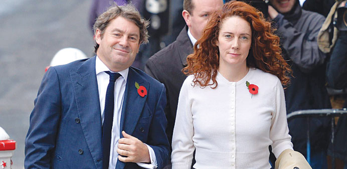 Rebekah Brooks and her husband Charlie arrive for the phone-hacking trial at the Old Bailey court in London yesterday.