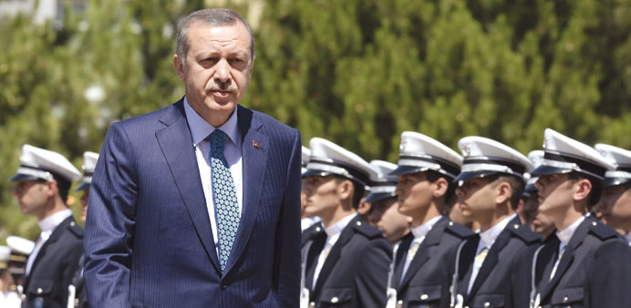 Erdogan reviews students of the police academy at their graduation ceremony in Ankara.
