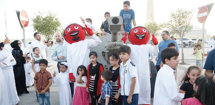 Ooredoou2019s Alrabaa with children at the site.