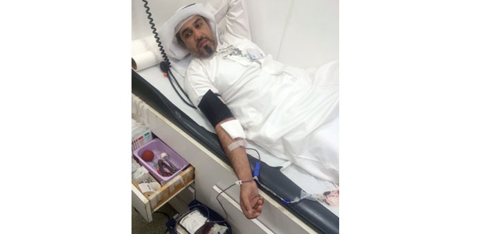 Dr Fahad al-Jaber, QSHESE department director, donating blood.