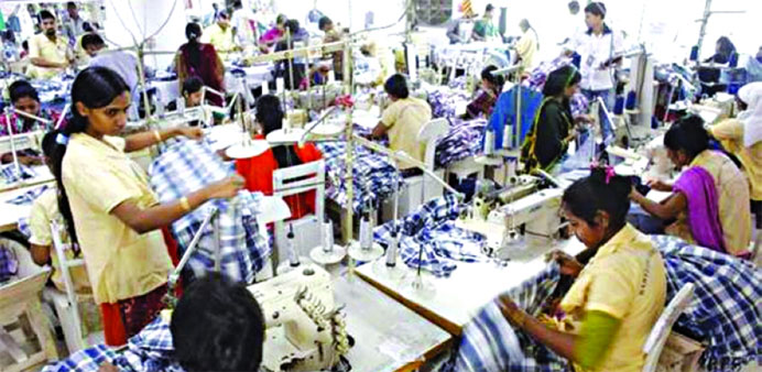 Employees working in a factory in Dhaka.