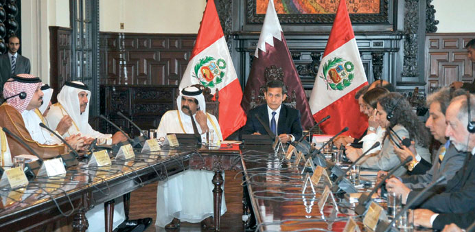 HH the Emir Sheikh Hamad bin Khalifa al-Thani and  Peruu2019s President Ollanta Humala take part in a meeting with ministers of both countries at the gove