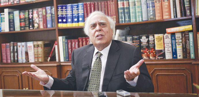 Telecommunications Minister Kapil Sibal gestures during an interview in New Delhi yesterday.