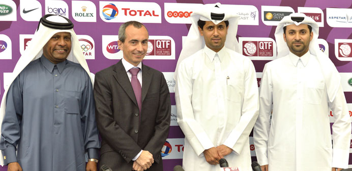 Public Relations manager Youssef al-Nesf, Total Qatar managing director Guillaume Chalmin, chairman of the Higher Organizing Committee Nasser bin Ghan