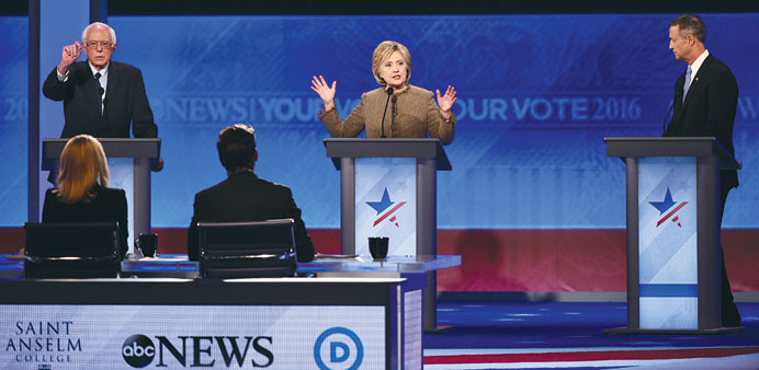 US Democratic presidential hopefuls Sanders (left), Clinton and Ou2019Malley participate in the Democratic Presidential Debate hosted by ABC News at Saint