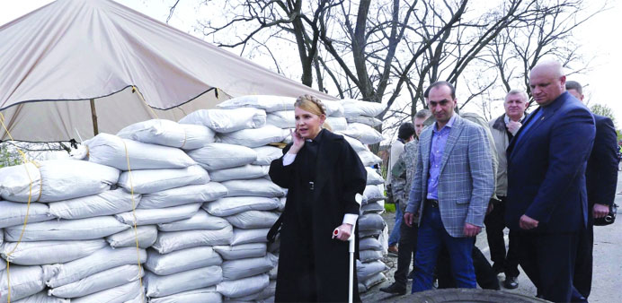 Tymoshenko visiting a pro-Ukrainian checkpoint in Dnipropetrovsk region yesterday.