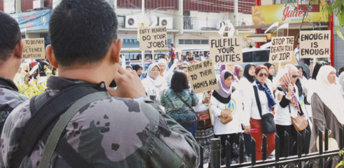 Zamboanga City residents who lost their homes during last yearu2019s siege, protest the governmentu2019s failure to address dismal conditions in evacuation ce