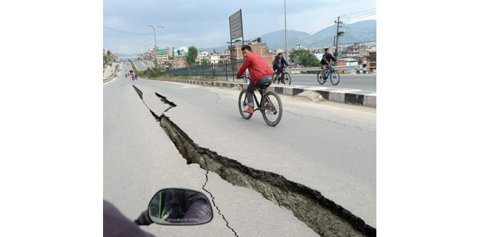A damaged road  after  the earthquake on the outskirts of Kathmandu.
