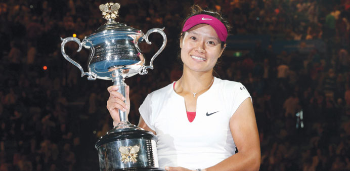 Li Na of China is all smiles after defeating Dominika Cibulkova to win the Australian Open in Melbourne, yesterday. (AFP)