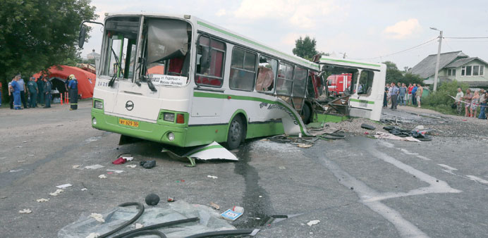  The wreckage of the bus at the scene of the collision near Oznobikhino village.