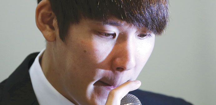 South Koreau2019s Olympic swimming champion Park Tae-hwan reacts as he answers reportersu2019 questions in Seoul yesterday. (Reuters)