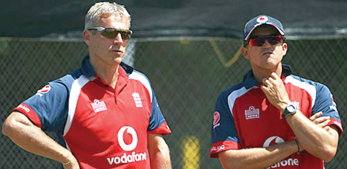 Peter Moores (left) and former England coach Andy Flower.