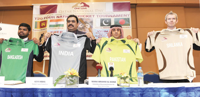 Azeem Abbas (second from left), Mana al-Mana and other officials displaying the shirts of the participating teams at yesterdayu2019s briefing. PICTURE: No
