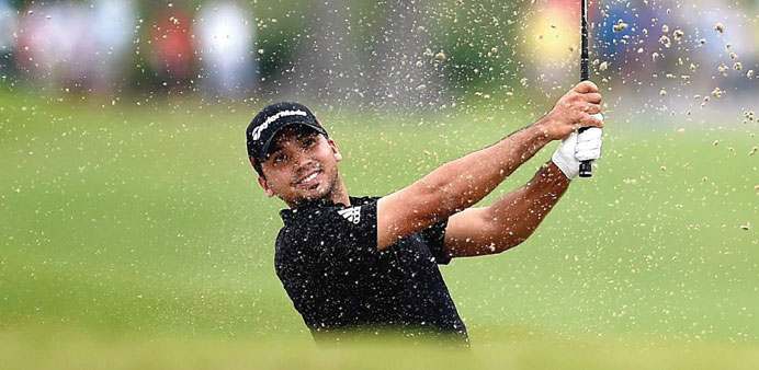Jason Day of Australia hits out of the bunker during the Zurich Classic of New Orleans at TPC Louisiana yesterday.  (AFP)