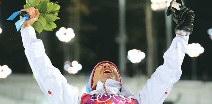 Ole Einar Bjoerndalen of Norway celebrates after winning the menu2019s biathlon at the Laura Biathlon Center in Krasnaya Polyana yesterday.