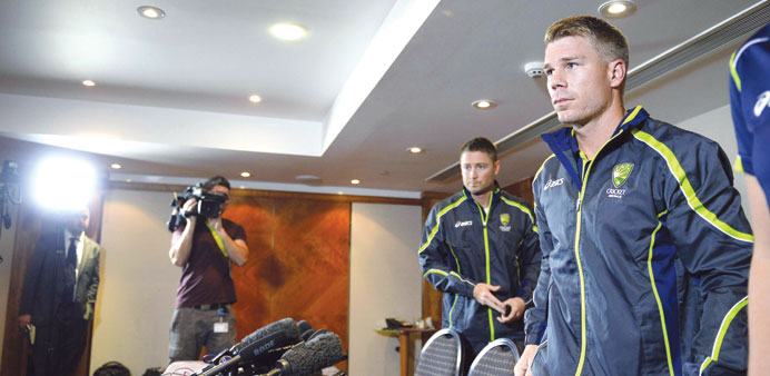 David Warner (right) was banned in the run-up to the opening match of the series after punching England batsman Joe Root.