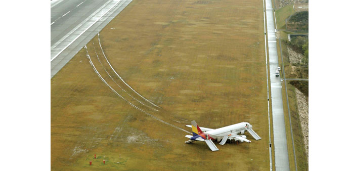 The Asiana Airlines airplane which skidded off the runway.