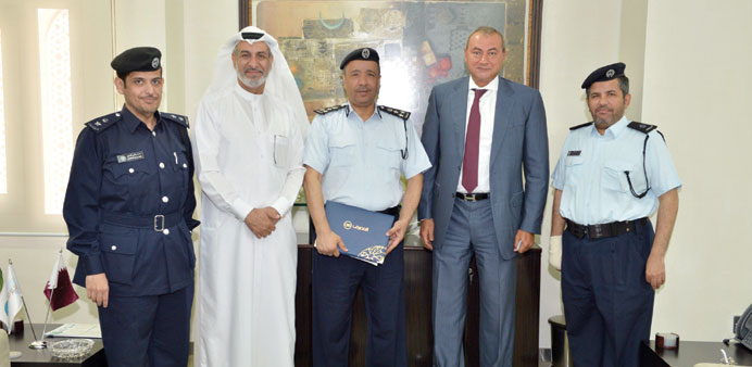 QIB and Traffic Department officials during the ceremony.