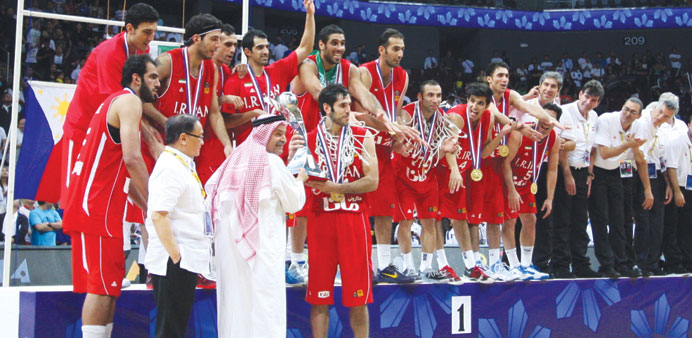 Iran players celebrate after winning the 27th FIBA Asian Menu2019s Basketball Championship in Manila yesterday.