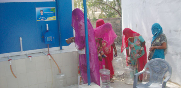 Rajasthani women queue up at a water ATM.