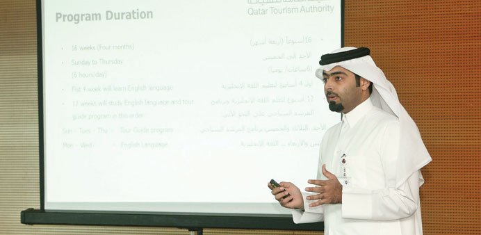 An official addressing the trainees at the induction event.