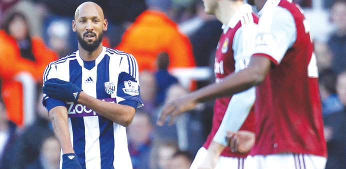 West Bromwich Albionu2019s French striker Nicolas Anelka gestures as he celebrates scoring the second goal during the English Premier League match against