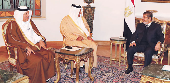 HE the Prime Minister and Foreign Minister HE Sheikh Hamad bin Jassim bin Jabor al-Thani holding talks with Egyptian President Mohamed Mursi in Cairo 