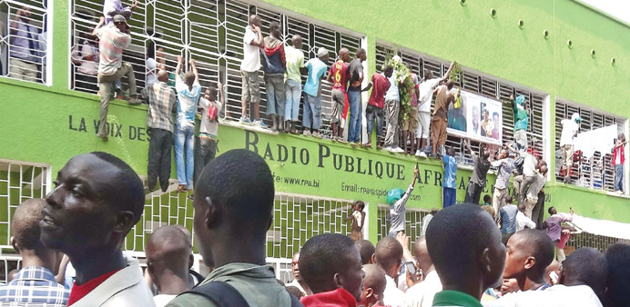 Burundians throng outside the headquarters of the popular private radio Radio Publique Africaine (RPA) u2013 nicknamed u2018Radio of the voicelessu2019 u2013 for a se