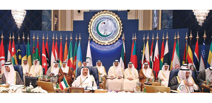 Sheikh Sabah chairs the OIC meeting in Kuwait City yesterday. 