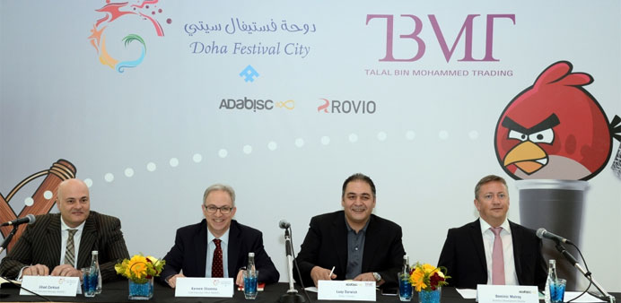 Officials of companies involved in the development of Doha Festival City speaking to reporters 