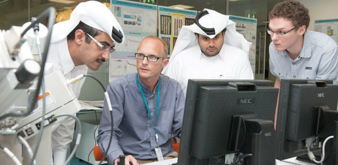 A group of researchers at work at the Maersk Oil Research and Technology Centre.