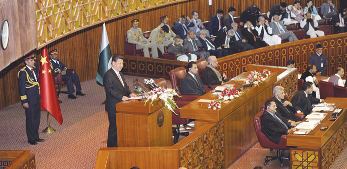 Chinese President Xi Jinping addresses a joint session of Parliament in Islamabad yesterday.