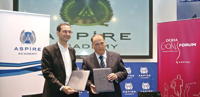 Aspire Academy director general Ivan Bravo (left)  with La Liga president Javier Tebas after they signed a Memorandum of Understanding to co-operate c