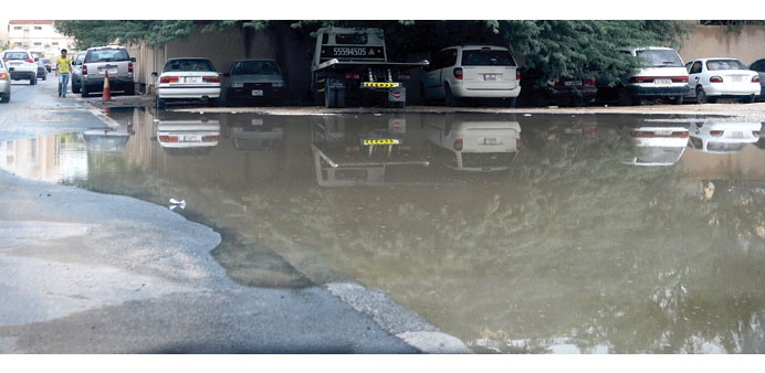Up against it: Puddles of water formed after the rain in Doha. These remain until the water evaporates, which takes quite a while.    Photograph: Shem