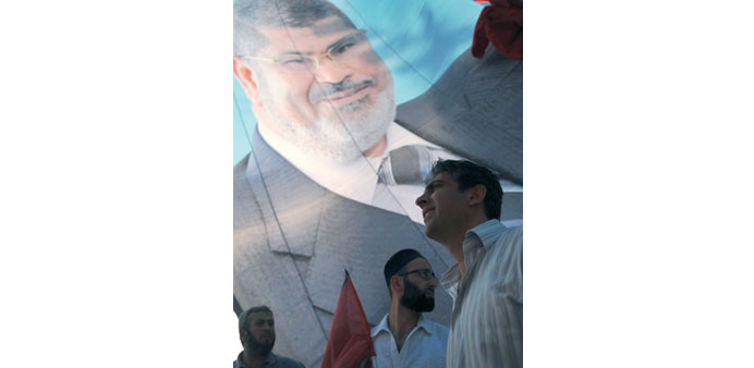 Turkish demonstrators take part in a pro-Mursi rally yesterday in Istanbul.