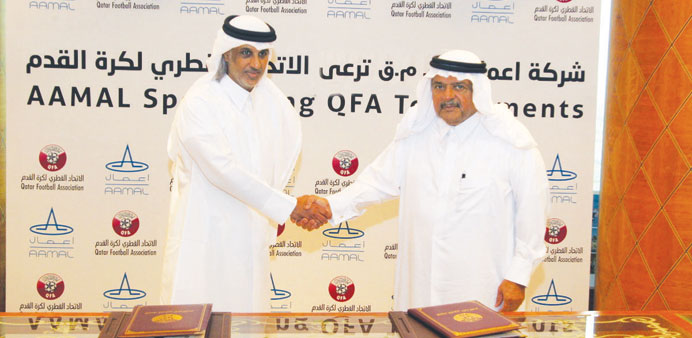 Sheikh Faisal and Sheikh Hamad after inking pact.