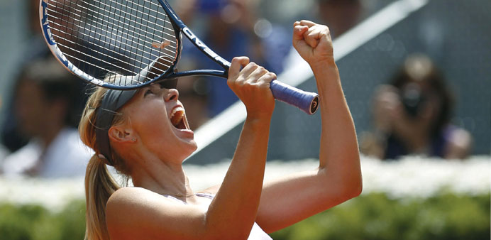 Maria Sharapova celebrates winning against Agnieszka Radwanska after their womenu2019s singles semi-final match at the Madrid Open yesterday.