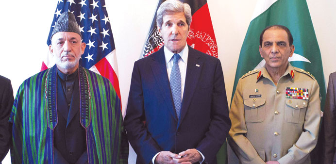 US Secretary of State John Kerry makes a statement before meeting Afghan President Hamid Karzai  and Pakistani Army chief General Ashfaq Parvez Kayani