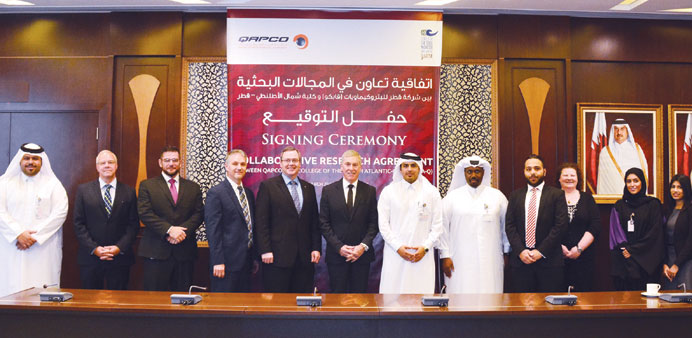  Qapco and CNA-Q officials at the signing ceremony.