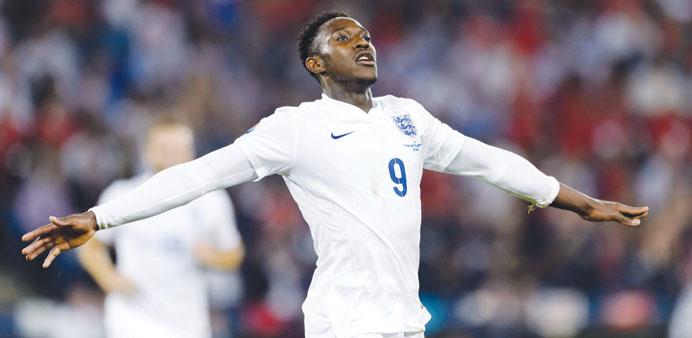 Englandu2019s Daniel Welbeck reacts after scoring his teamu2019s second goal against Switzerland during their Euro 2016 qualifying match at the St. Jakob-Park