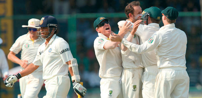 Australiau2019s Nathan Lyon celebrates the wicket of Indiau2019s Sachin Tendulkar on the second day of the fourth Test yesterday.