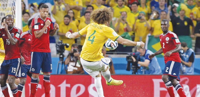 Brazilu2019s David Luiz  scoring the 2-0 goal during the quarter-final match with Colombia yesterday.