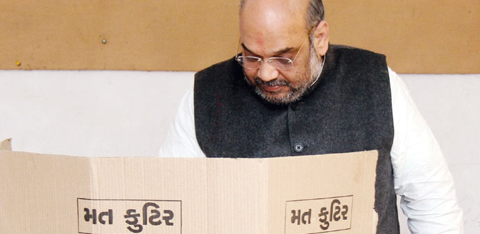 BJP chief Amit Shah casts his vote during the first phase of the local body elections in Ahmedabad yesterday.