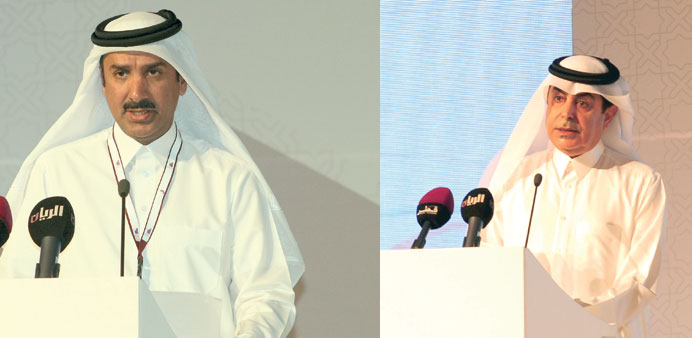 Sheikh Hamad bin Jaber bin Jassim al-Thani and Nasser bin Abdulaziz al-Nasser addressing the forum.