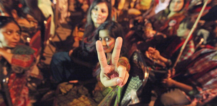 Supporters of Imran Khan pose for a photograph as they listen to his speech in Islamabad.
