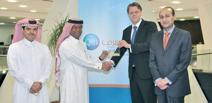QIB and Commerzbank officials at the award ceremony.